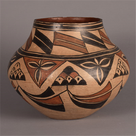 Item # C4592D  Price: $15000
Polychrome Pottery Jar by Martina Vigil and Florentino Montoya of San Ildefonso Pueblo.
https://www.adobegallery.com/art/san-ildefonso-polychrome-olla-martina-vigil-rain-cloud-designs
The presence of a traditional San Ildefonso stone polished slip allows us to date this piece to the late 1800s.