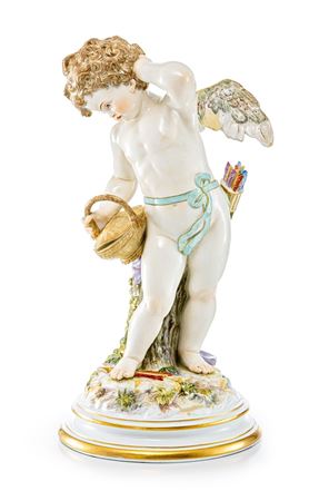 Heinrich Schwabe : On a round base the cupid boy in a thoughtful pose, a basket in his right hand.