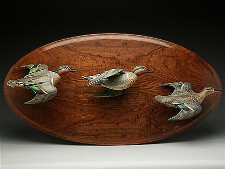 Josh Brewer : Three carved flying teal mounted on hardwood backboard