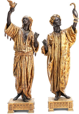 Anatole Jean Guillot : A pair of late 19th / early 20th century coldpainted spelter orientalist figures of Arab traders