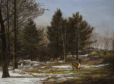 Pieter Gerardus van Os : A WOODED WINTER LANDSCAPE WITH DEER